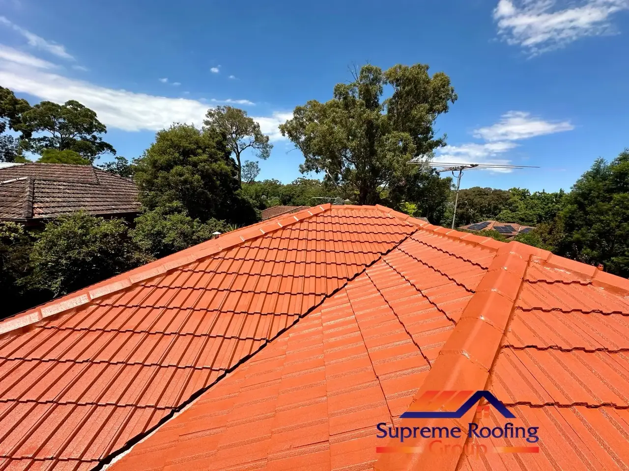 Finished terracotta roof tiles and ridge caps after restoration in Blackburn