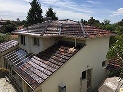 Completed terracotta tile roof restoration in Doncaster East, Melbourne