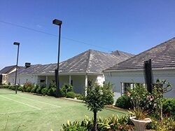 Weathered cement tile roof condition before repairs