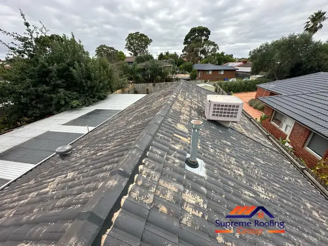 Worn cement roof tiles before pressure cleaning in Bentleigh East