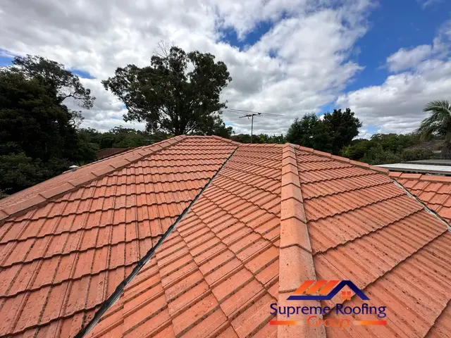Weathered cement tile roof before restoration in Blackburn