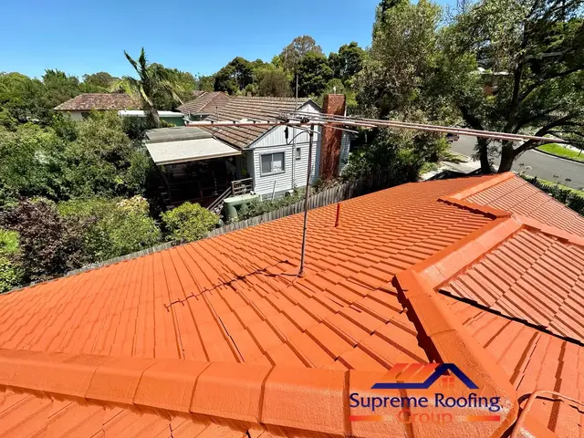Terracotta colour coating applied during a Blackburn roof restoration