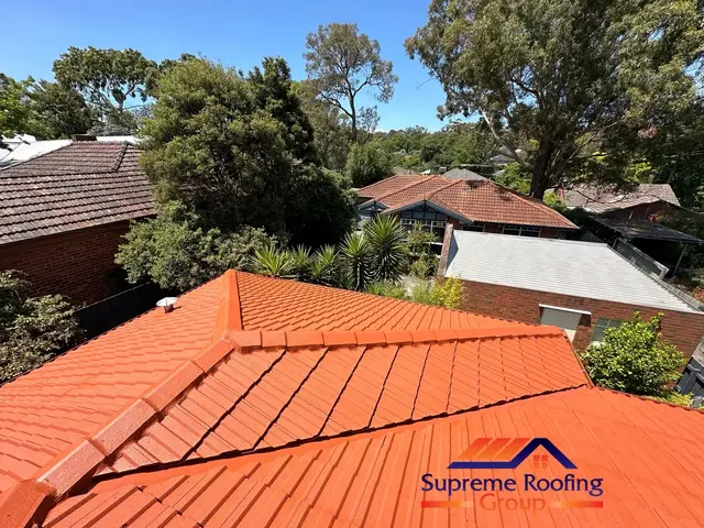 Wide view of a Blackburn cement tile roof painted Terracotta