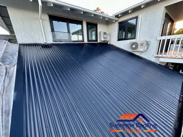 Finished lower corrugated roof painted Bluestone in Brighton
