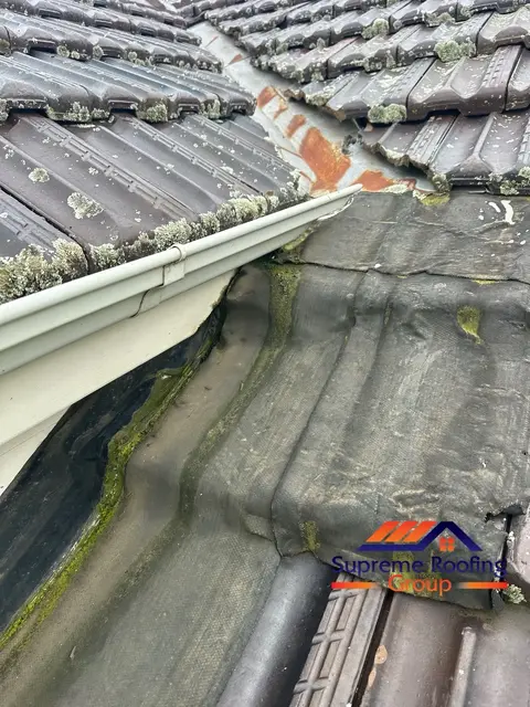 Deteriorated flashing at the roof and gutter-side wall junction in Canterbury