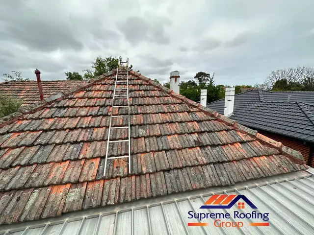 Terracotta tiled roof before repair and repointing in Carnegie