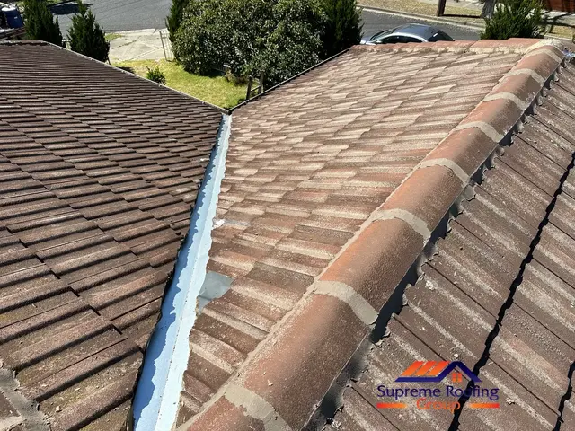 Completed metal valley and storm-seal roof repair in Clayton