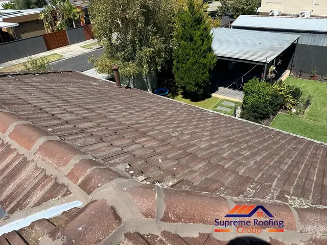 New storm seals being installed beside the replacement roof valley in Clayton