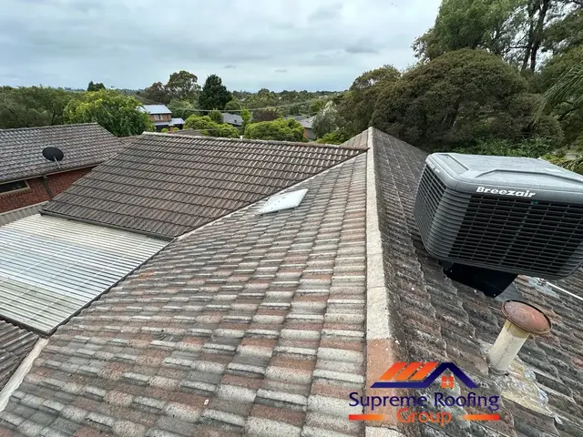 Weathered cement tile roof before restoration in Croydon Hills
