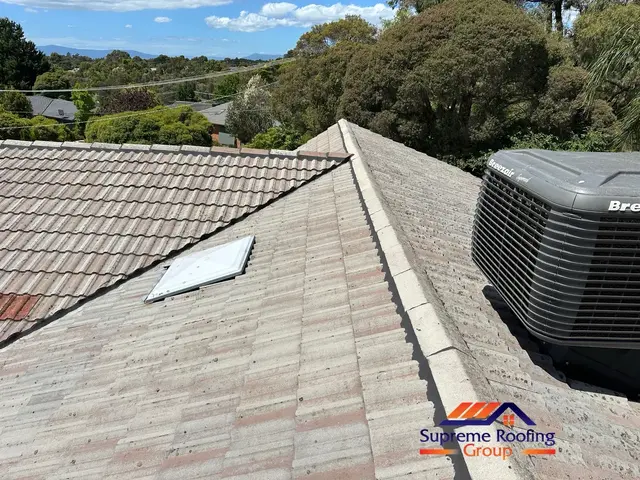 Cleaned cement tiles and prepared ridge work during restoration in Croydon Hills