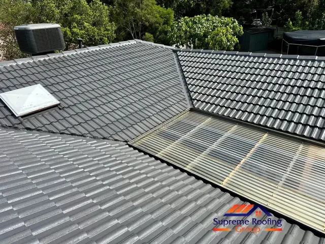 Wide view of the restored Croydon Hills roof painted Woodland Grey