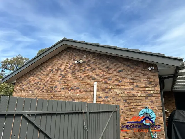 Completed Croydon Hills gable repair with repointed tiles and Woodland Grey trim
