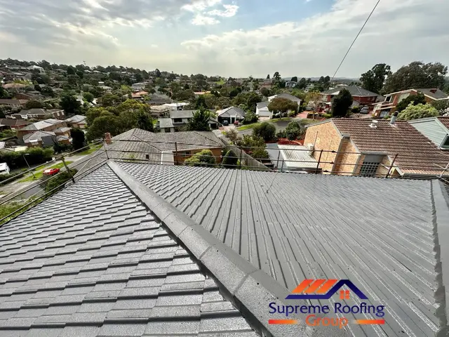Main cement tile roof painted Charcoal after restoration in Doncaster East