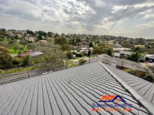 Completed rear roof planes painted Charcoal in Doncaster East