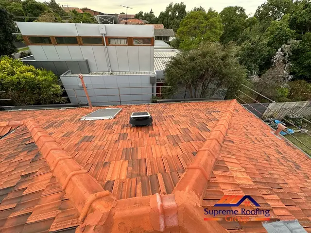 Completed Elsternwick terracotta roof restoration with renewed ridge and hip work
