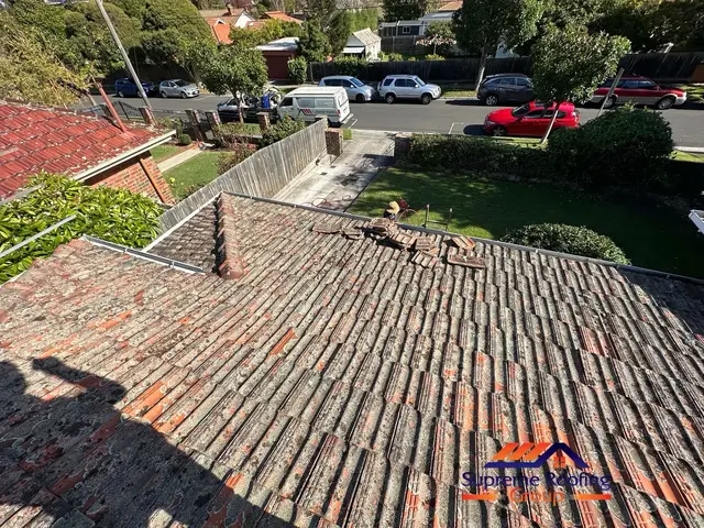 Weathered terracotta roof before cleaning and repairs in Elsternwick