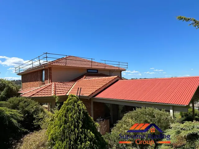 Completed natural terracotta roof restoration viewed from the rear in Eltham