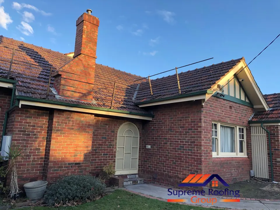 Completed terracotta roof restoration viewed from the Kew property exterior