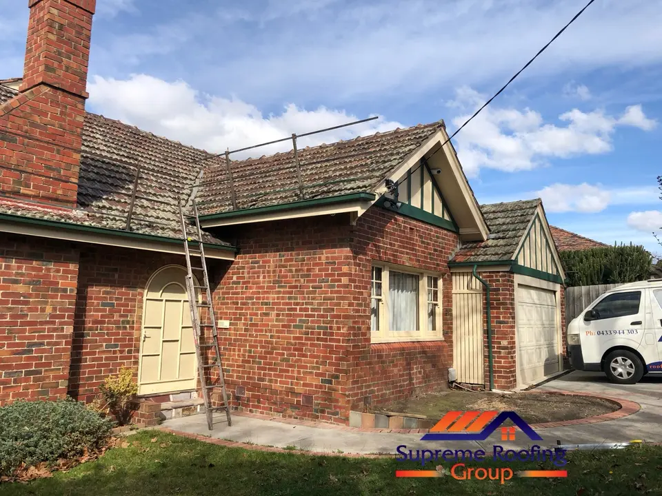 Kew home before terracotta roof restoration with moss and lichen visible on the tiles