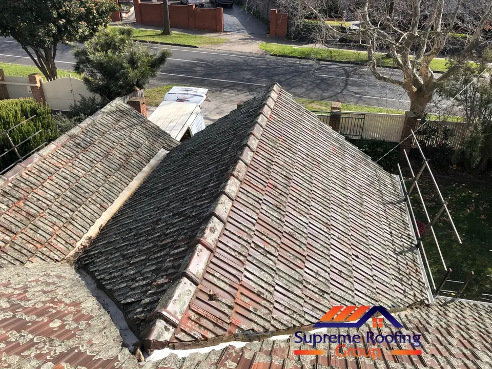 Rear sections of the weathered terracotta roof before restoration in Kew