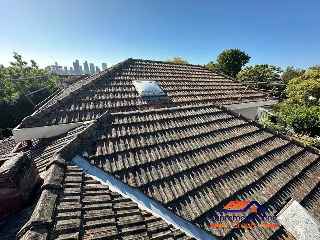 Weathered Mont Albert terracotta roof with widespread lichen before cleaning