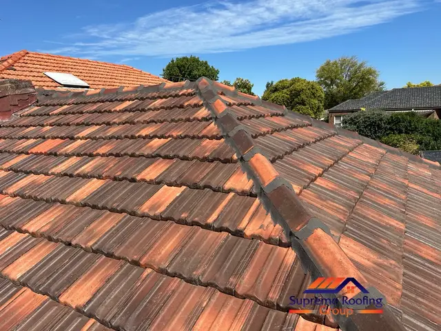 Repointed ridge caps on the cleaned terracotta roof in Mont Albert