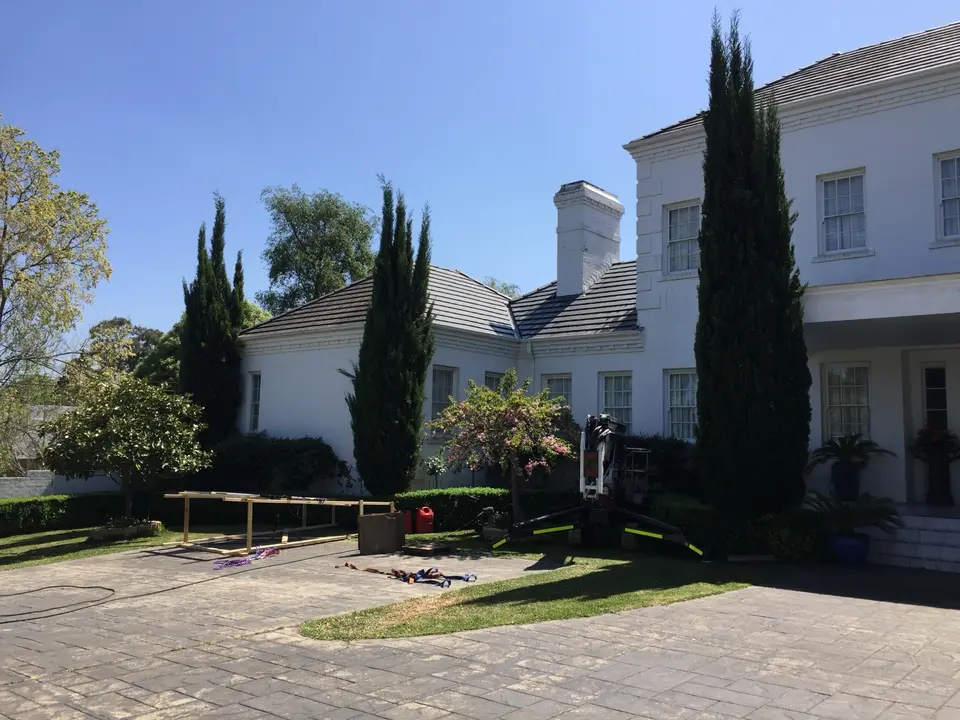 Front view of Templestowe home before high-pitched cement tile roof restoration