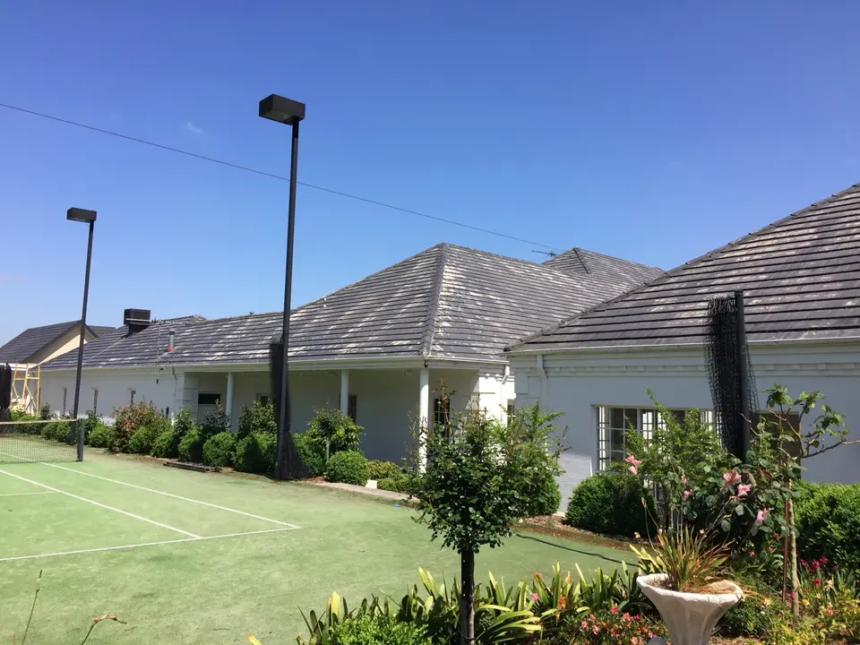 Rear view of the weathered cement tile roof before restoration in Templestowe