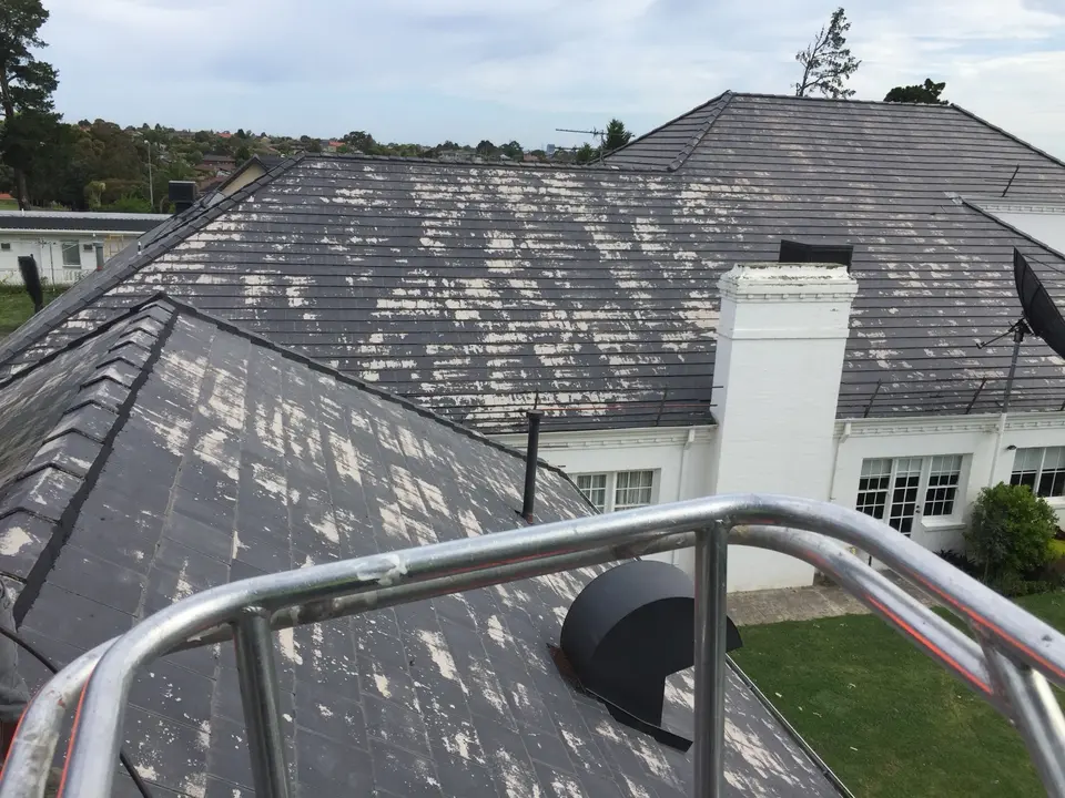 Wide view of the prepared roof surface before charcoal coating in Templestowe