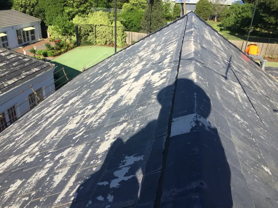 High-pitched ridge section showing worn coating before restoration in Templestowe