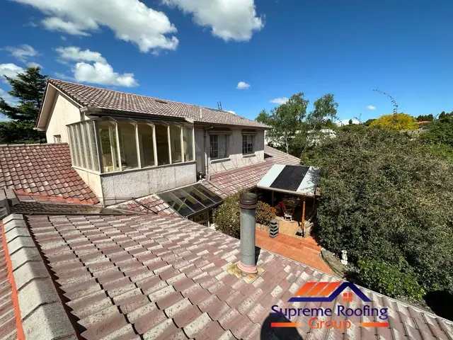 Rear roof planes before the Wantirna South cement tile restoration