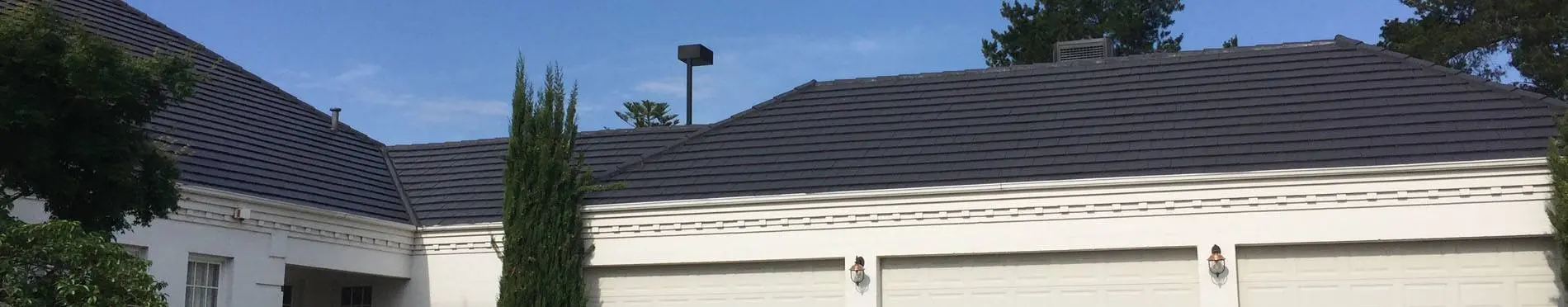 Completed charcoal tiled roof after restoration in Melbourne