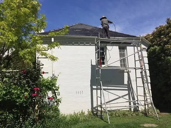 Professional roof and gutter cleaning on a Melbourne home