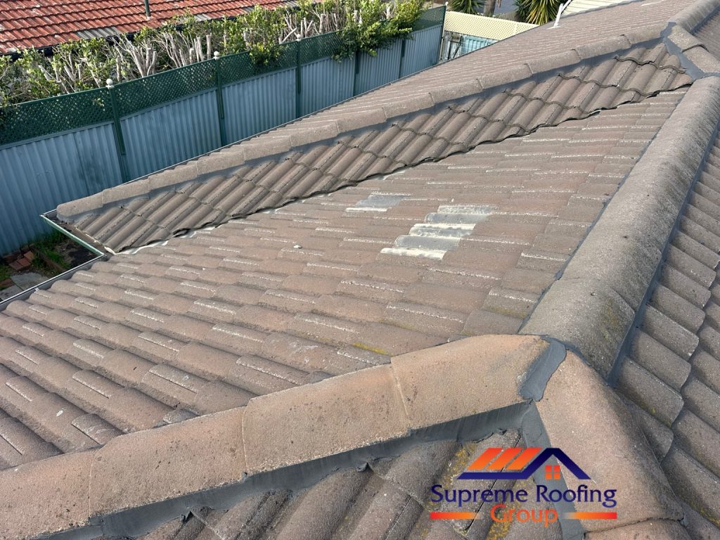 Renewed pointing around ridge and hip junctions on the Bentleigh East cement tile roof