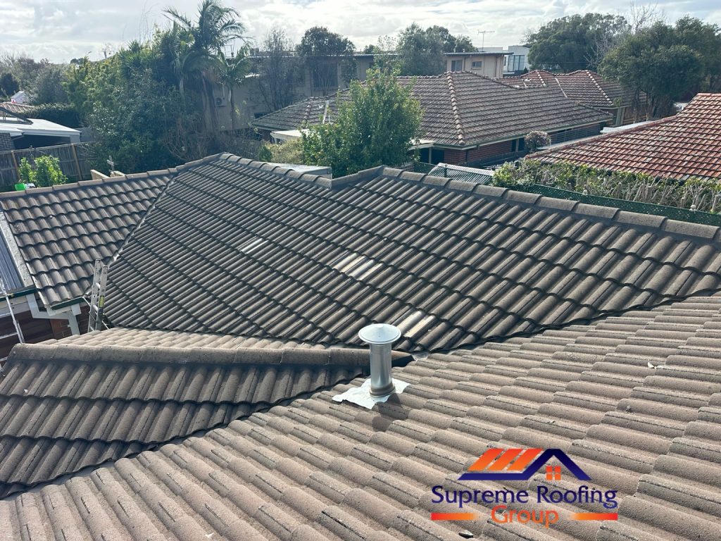 Wide view of the Bentleigh East tiled roof after repointing and tile repairs