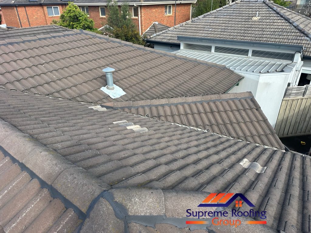 Completed Bentleigh East roof repairs showing renewed capping pointing and replacement roof tiles