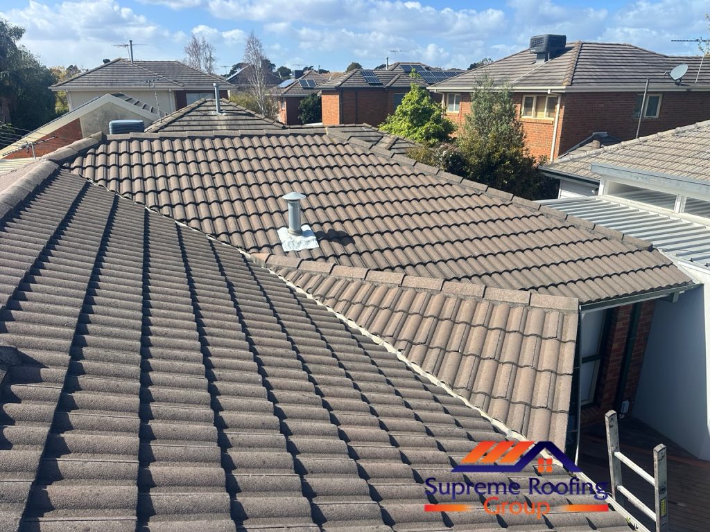 Overview of the Bentleigh East cement tile roof before ridge, gable and valley junction repairs