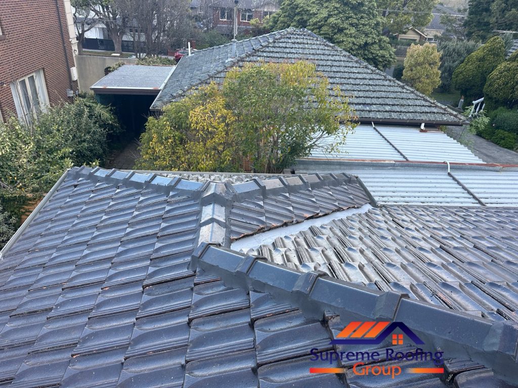 Cleaned Camberwell roof tiles and renewed pointing around intersecting hips