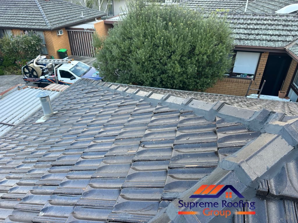 Cleaned roof tiles and repointed hip capping at the Camberwell property
