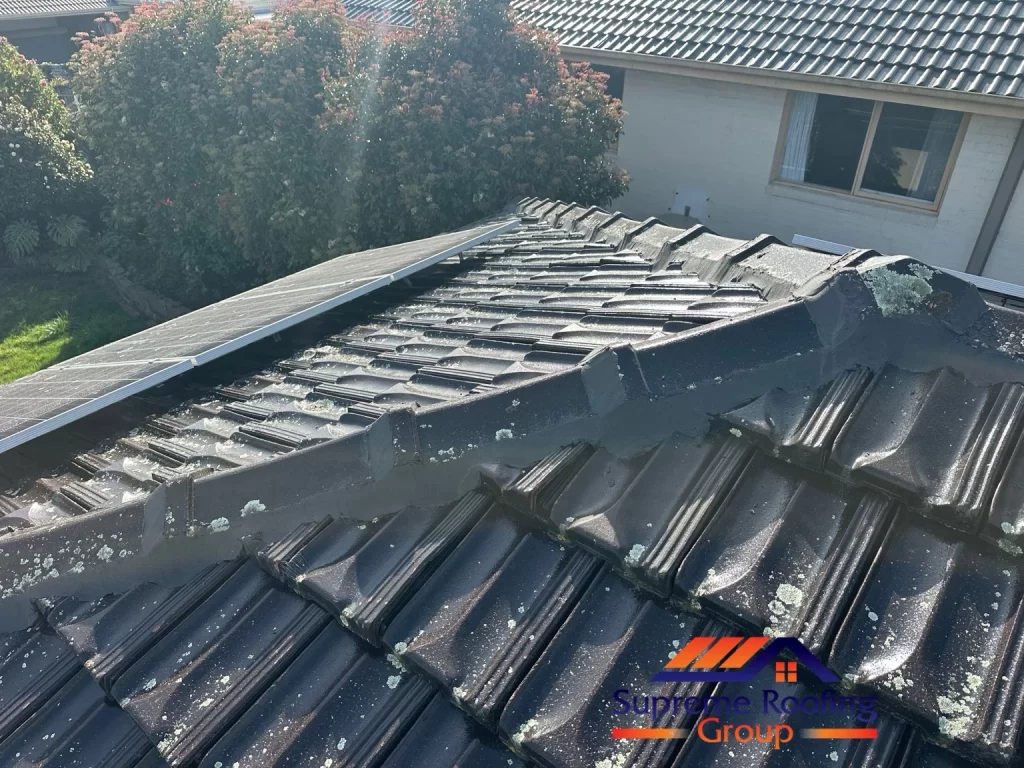 Repointed hip capping beside the existing solar panels