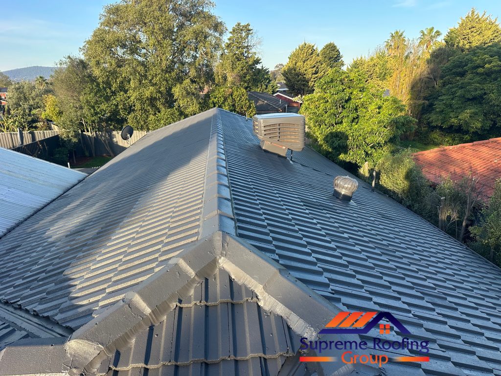 Completed Monument tiled roof in Rowville, showing the main ridge and adjoining roof slopes