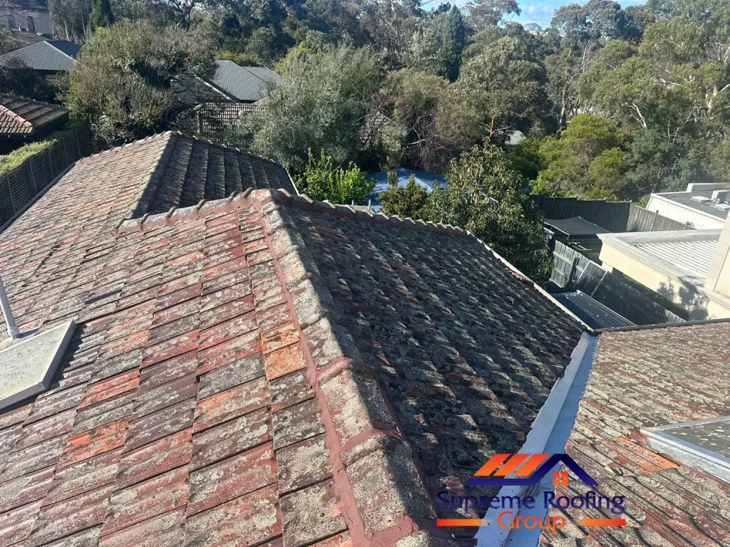 Completed repointing along the terracotta roof hips in Surrey Hills