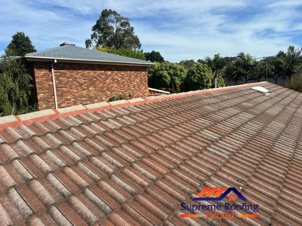 Wide view of completed ridge repointing on the Croydon Hills tiled roof