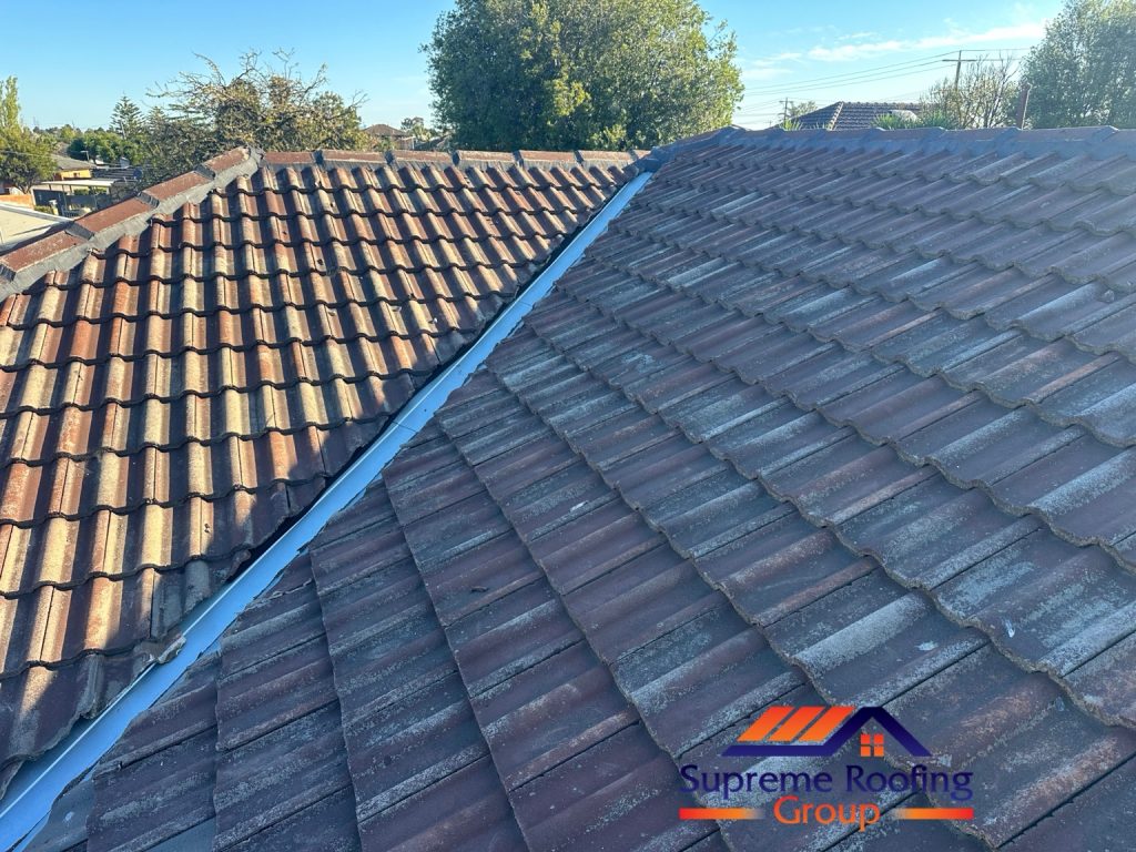 Replacement metal valley between tiled roof slopes at the Thomastown property