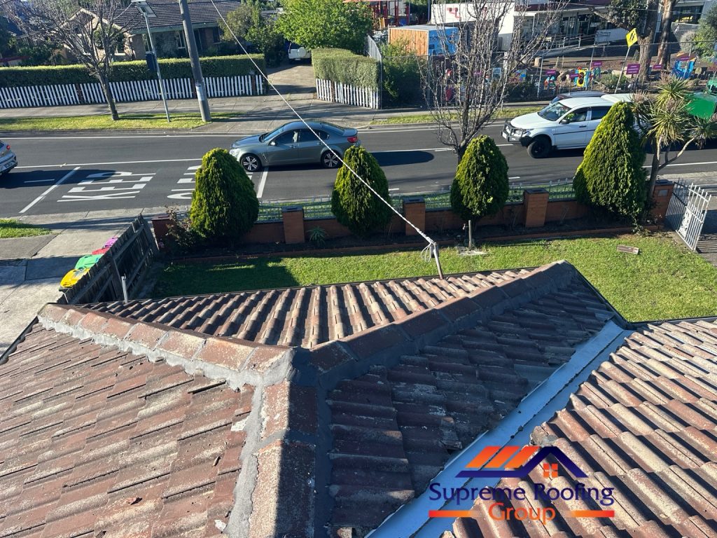 Replacement valley and repointed hip caps on the Thomastown tiled roof