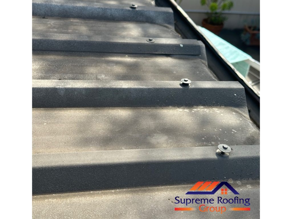 Existing fixings on the Toorak metal roof sheets