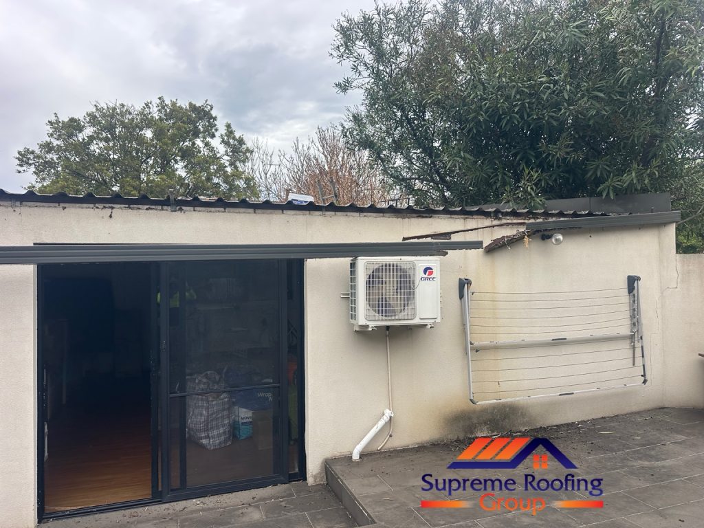 Removed rusted gutter sections at the Toorak metal roof repair project
